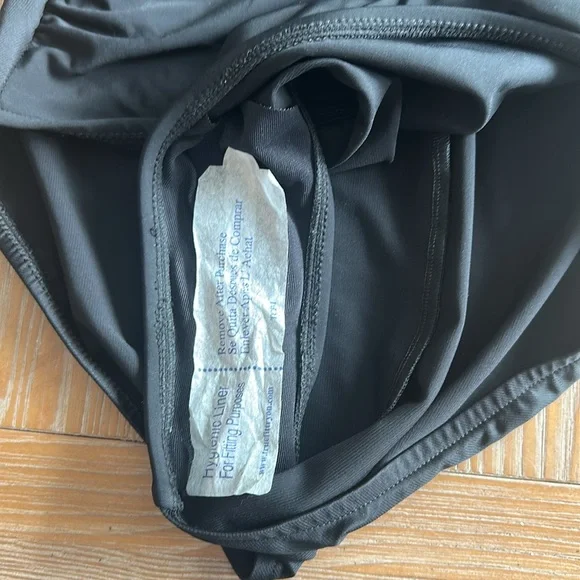 Women’s black magic suit bathing suit size 14 One Pieces